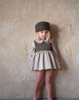 [popelin]   Mod.1.3 Sand romper suit with skirt and baby collar